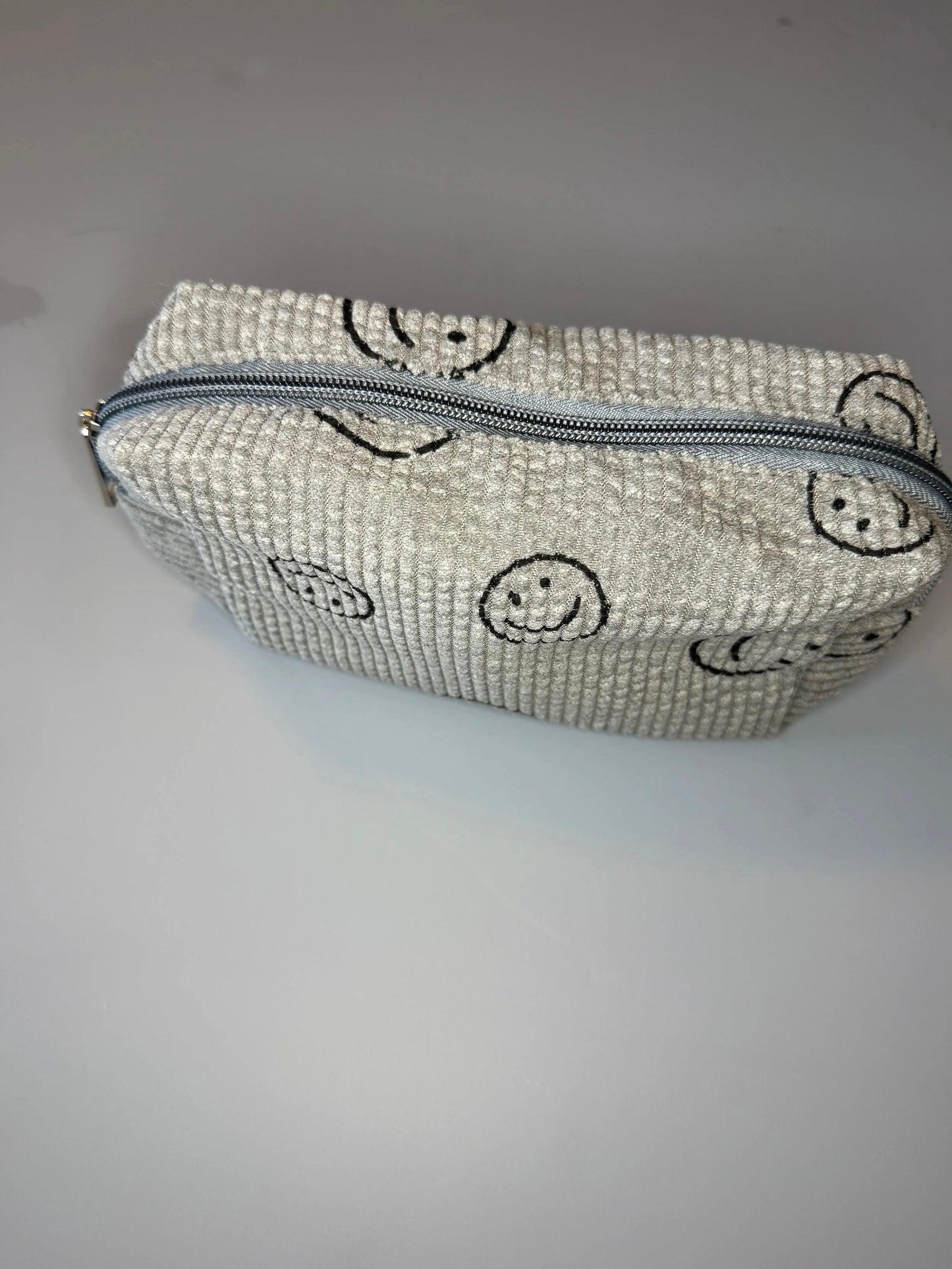 smiley pouch